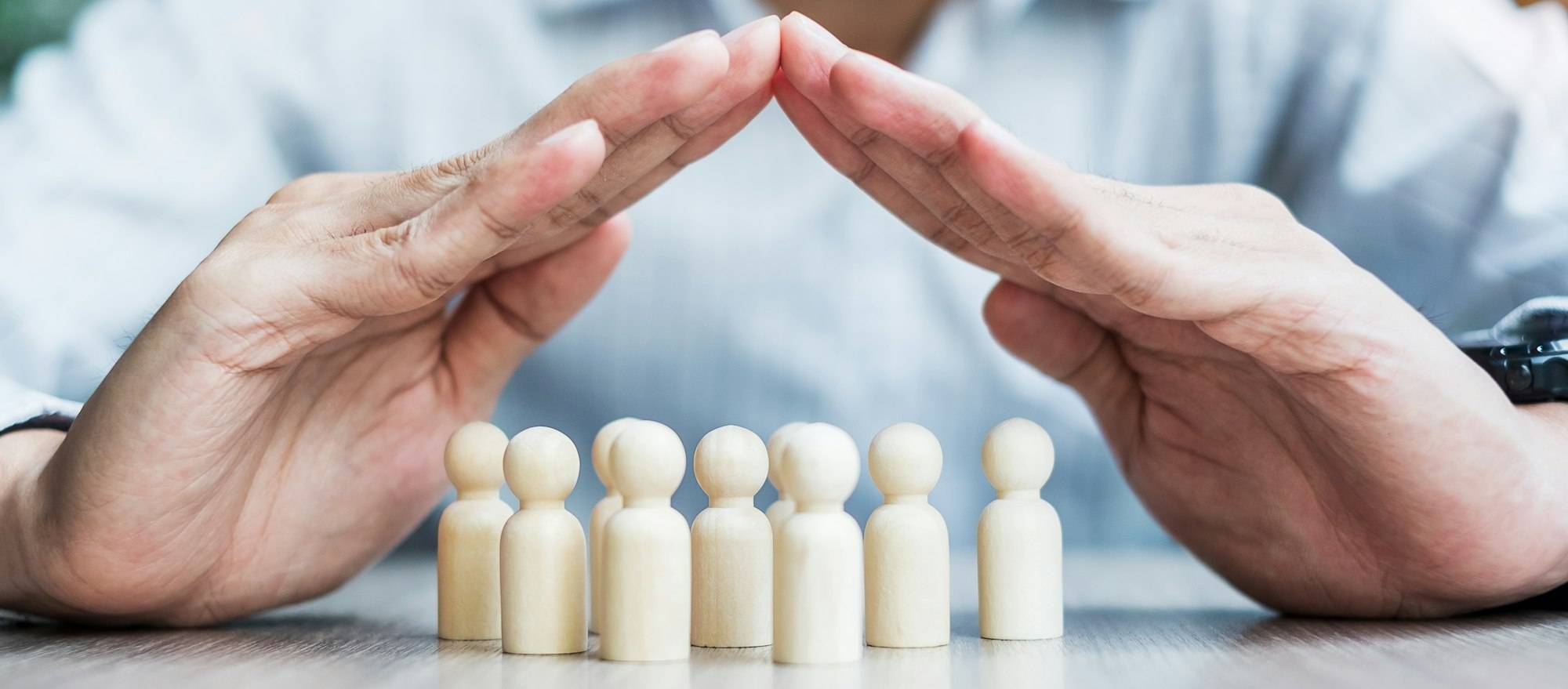 Businessman hand cover man wooden from crowd of employees. People, Business, Human resource